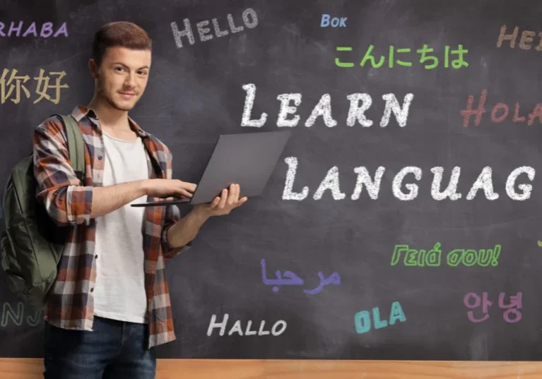 Person studying languages on chalkboard background